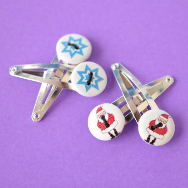 Two Pairs of Hair Clips Father Christmas and Star