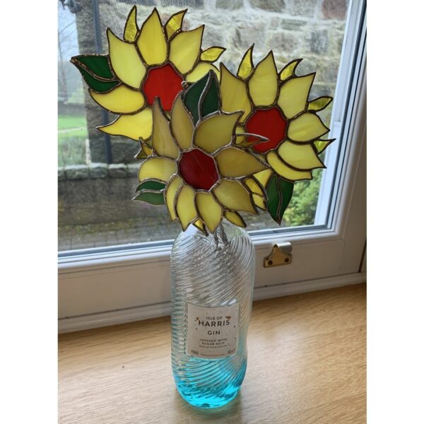 Sunflowers with bottle