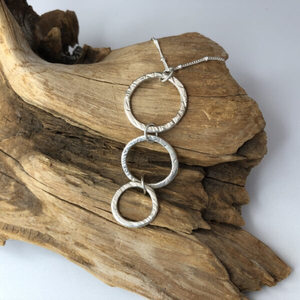 Trio of Sterling Silver Rings Pendant