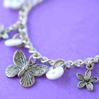 Child’s White Butterfly Button Charm Bracelet thumbnail