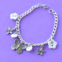 Child’s White Butterfly Button Charm Bracelet thumbnail