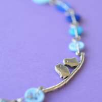 Blue Bird on a Wire Necklace thumbnail