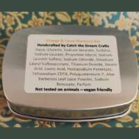 Orange & Clove Solid Shampoo in a tin thumbnail