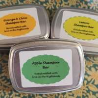 Orange & Clove Solid Shampoo in a tin thumbnail