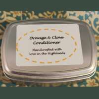 Orange & Clove Solid Conditioner in a tin thumbnail