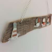 Driftwood with Three Boats and a Lighthouse thumbnail