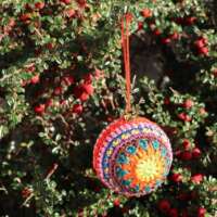 Multi-Coloured Crochet Christmas Bauble Green Star thumbnail
