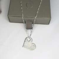 Sterling Silver Textured Heart with Cut Out Heart Pendant thumbnail