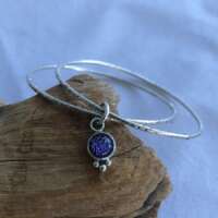 Double Silver Bangle with Purple Dichroic Glass Bead thumbnail